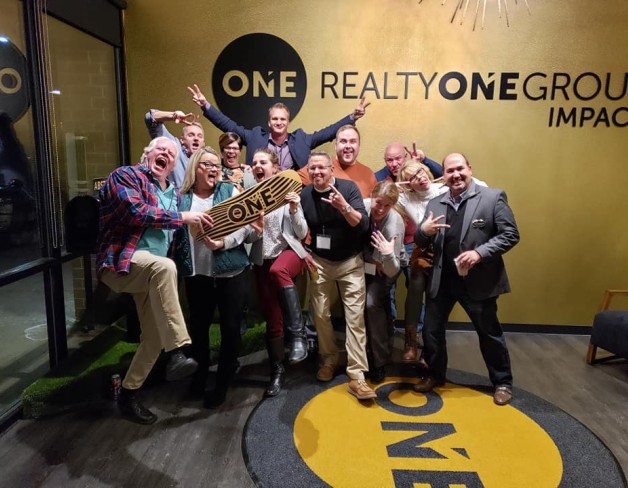 Image of Realty ONE group Impact Office having some fun! 