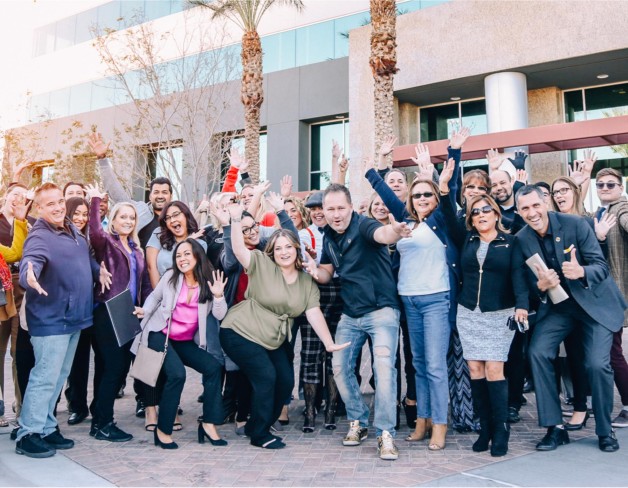 CEO & Founder Kuba Jewgieniew and some happy Realty ONE Group Pros!